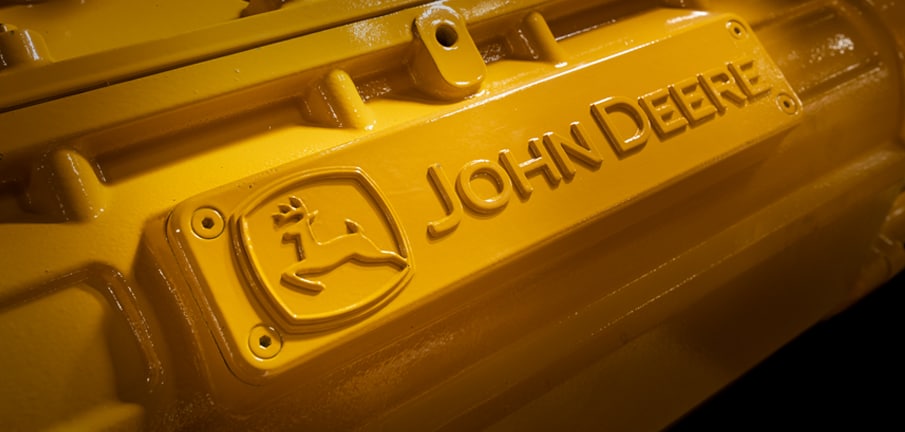 Close up of the John Deere logo on an engine block