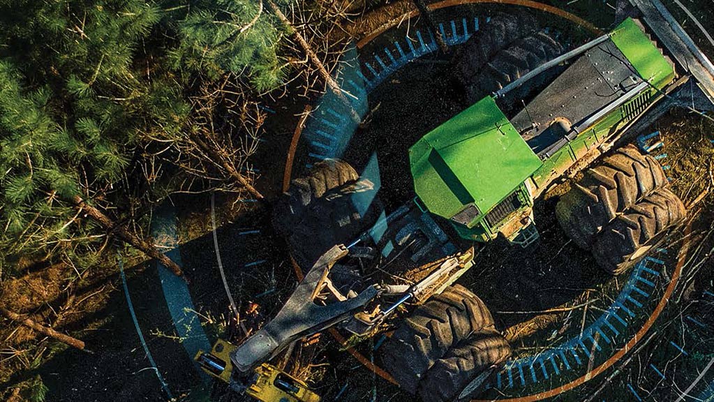 Aerial view of forestry equipment surrounded by a computer-generated overlay of a sensor circle