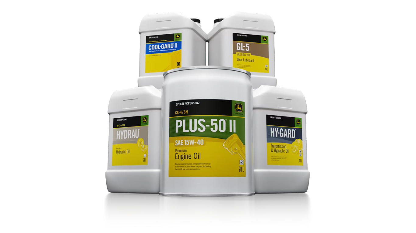 a studio image of five different John Deere oils and lubricants on a white background
