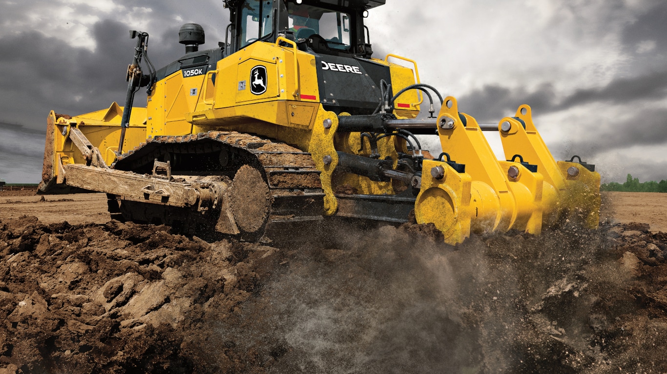 Rear-view of a 1050K Dozer at a worksite.