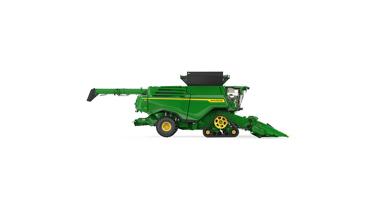 Left side-view of x9 1100 combine on a white background