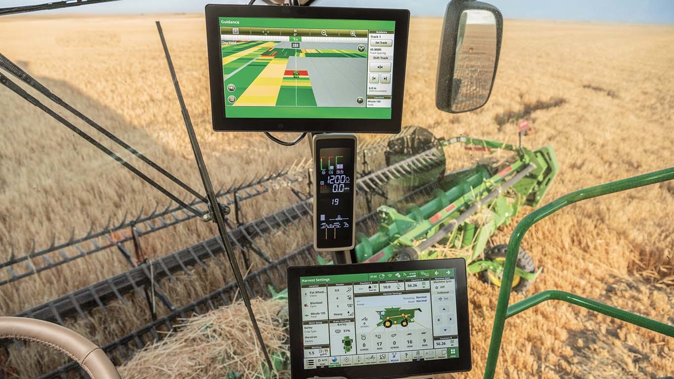 Multiple screens in a tractor cab