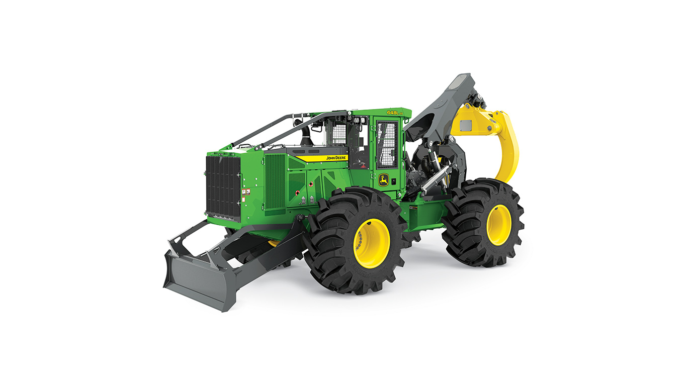 Green and yellow John Deere forestry machine with large tires and front grapple attachment.