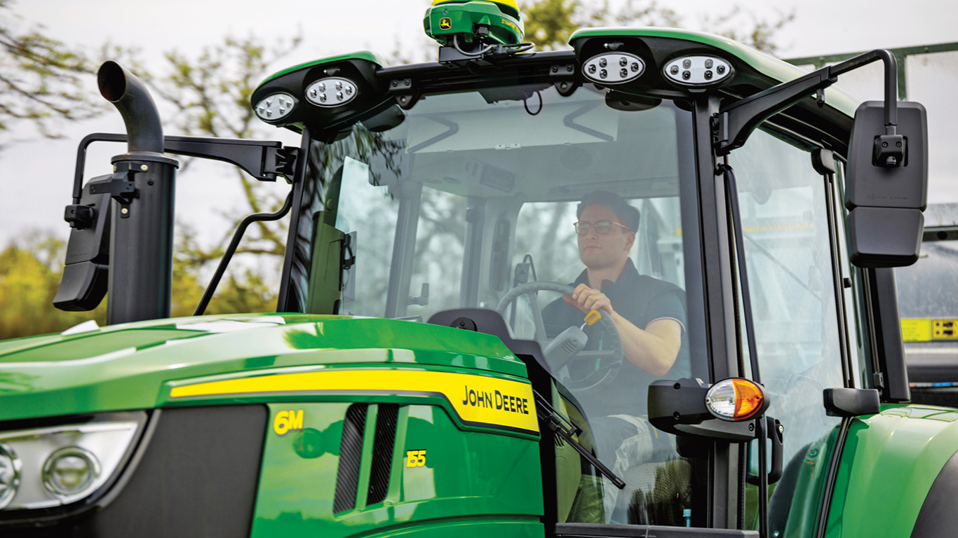 person driving 6M155 tractor person driving 6M155 tractor