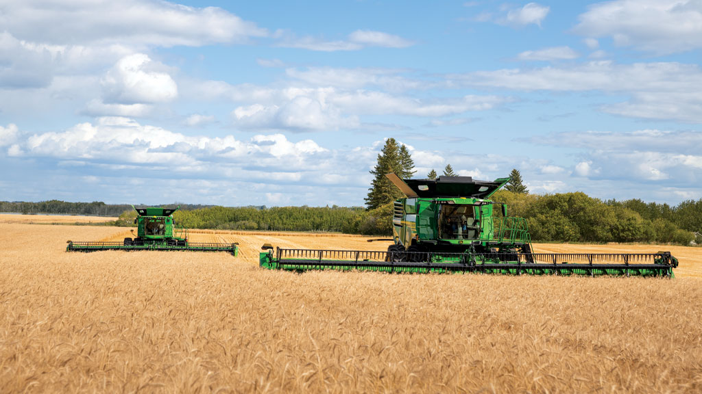 X-Series Combine Harvester moving through wheat crops