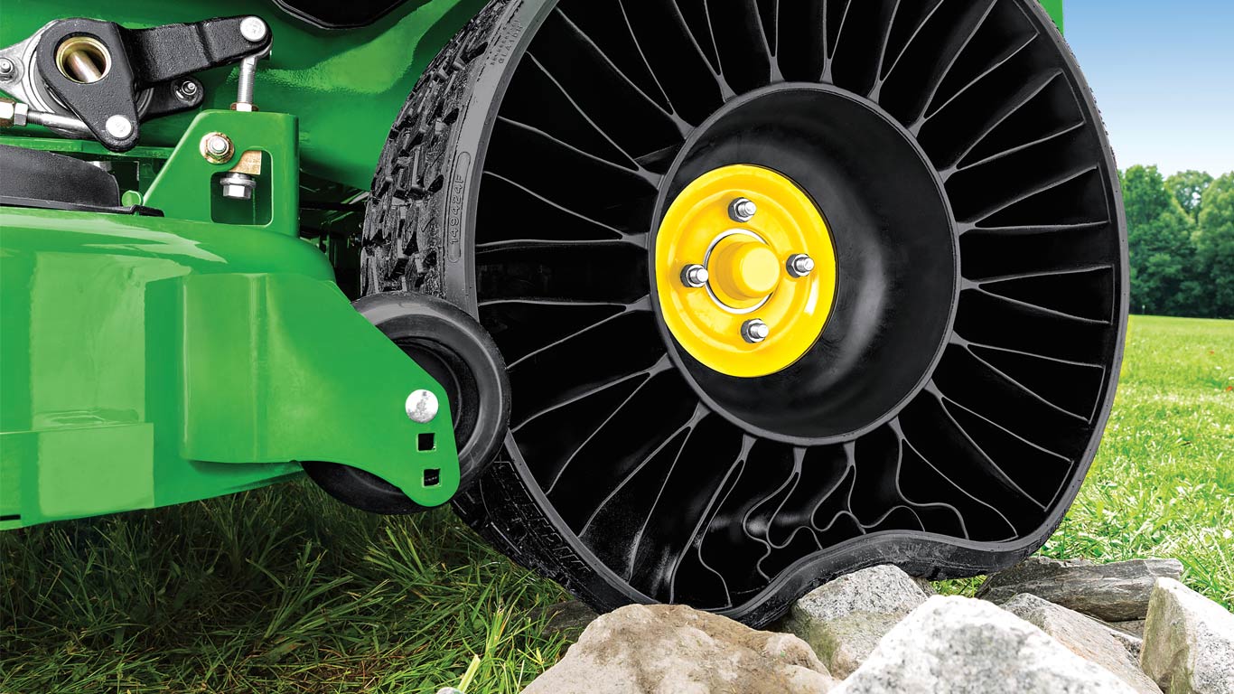 Airless radial tire for heavy-duty lawn care applications