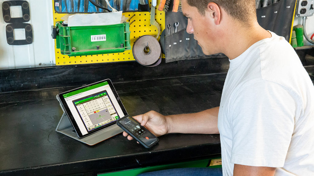 man working with a smart phone and tablet man working with a smart phone and tablet