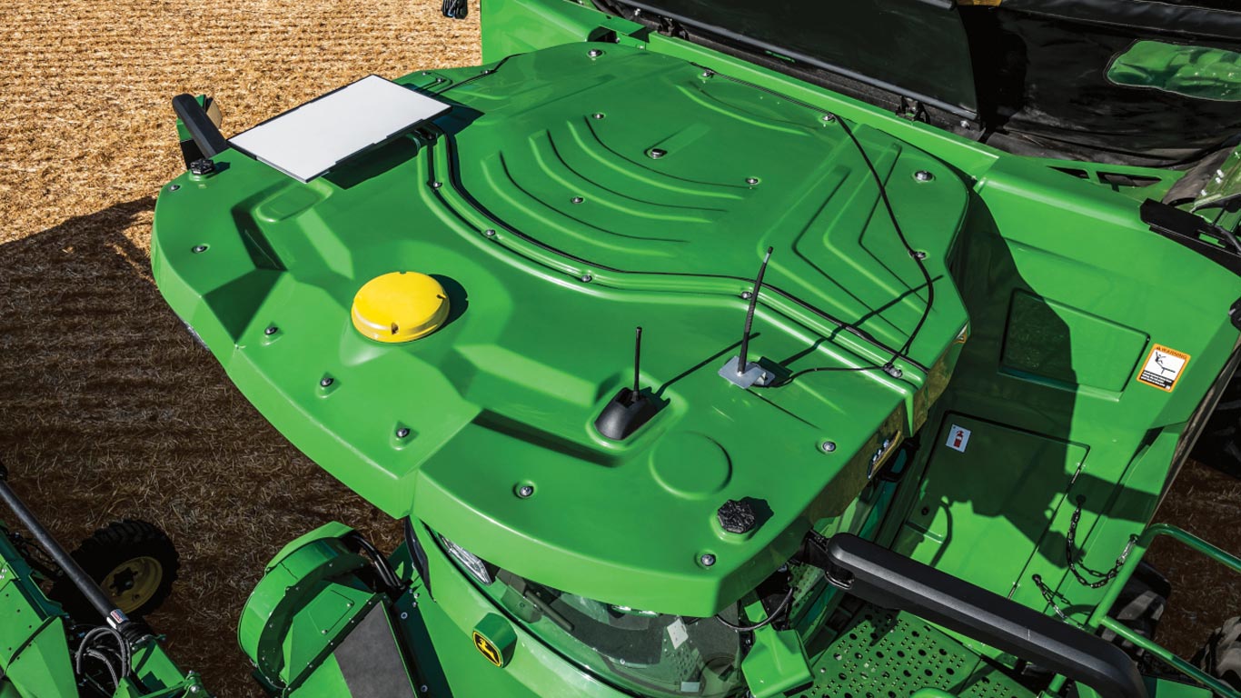 Aerial view of tractor cab roof with JDLink Boost installed