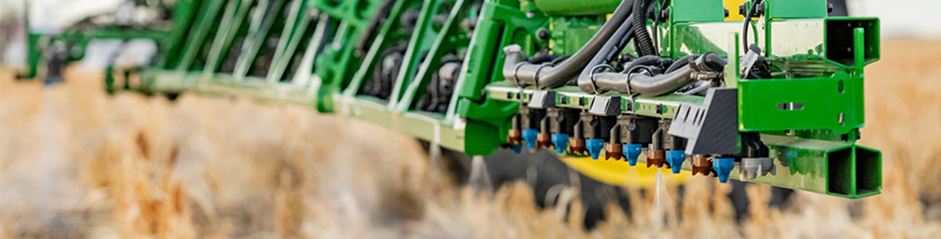 Person using a G5 Display in the cab of a tractor