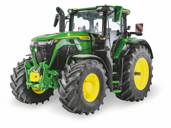 John Deere 6R tractor with enclosed cab and large agricultural tires, shown in a studio view for modern farming operations